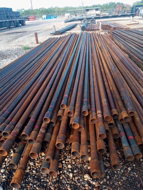 Steel pipe stock organized on-site ahead of fabrication